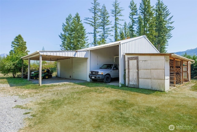 15932 427th Ave SE, Gold Bar, WA 98251 - view of pole building featuring a mountain view and a yard
