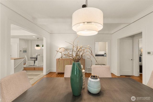 1515 2nd Ave W, Seattle, WA 98119 - dining room with wood finished floors and crown molding