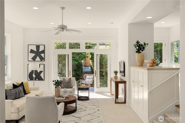 1515 2nd Ave W, Seattle, WA 98119 - living room featuring plenty of natural light, a ceiling fan, recessed lighting, and light carpet