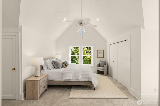 1515 2nd Ave W, Seattle, WA 98119 - bedroom with light colored carpet, recessed lighting, ceiling fan, vaulted ceiling, and a closet