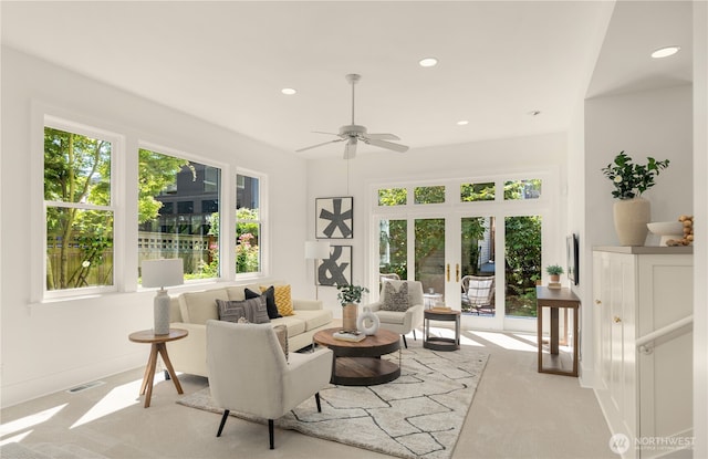 1515 2nd Ave W, Seattle, WA 98119 - carpeted living room with a ceiling fan and recessed lighting