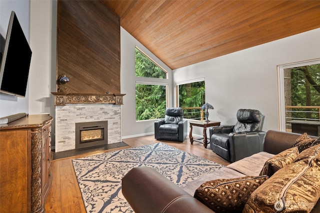 19833 95th Ave NE, Bothell, WA 98011 - living area with plenty of natural light, wooden ceiling, a tile fireplace, wood finished floors, and high vaulted ceiling