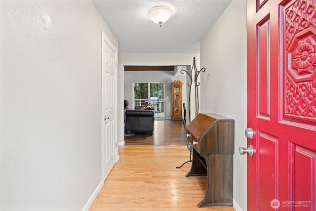 19833 95th Ave NE, Bothell, WA 98011 - entrance foyer featuring light wood finished floors and a textured ceiling