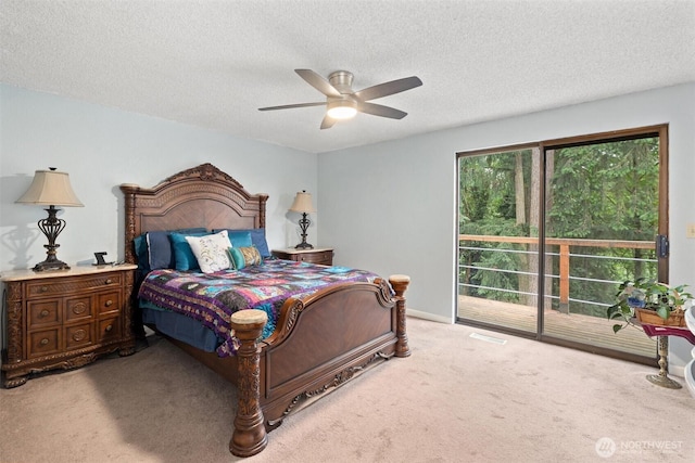 19833 95th Ave NE, Bothell, WA 98011 - bedroom featuring carpet flooring, access to exterior, a textured ceiling, and ceiling fan
