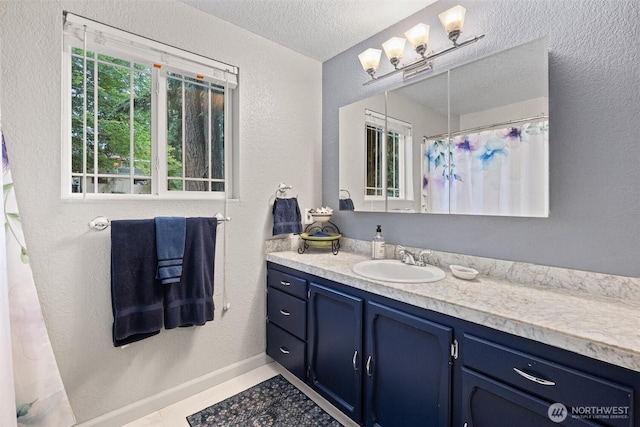 19833 95th Ave NE, Bothell, WA 98011 - bathroom featuring vanity, a textured wall, a textured ceiling, curtained shower, and tile patterned flooring