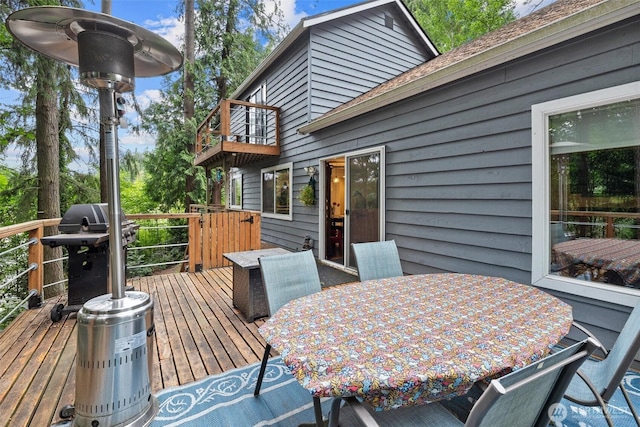 19833 95th Ave NE, Bothell, WA 98011 - deck featuring outdoor dining space and a grill