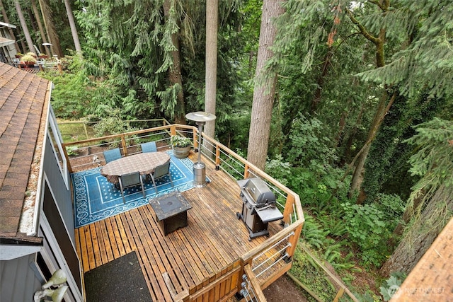 19833 95th Ave NE, Bothell, WA 98011 - wooden deck with outdoor dining space and area for grilling
