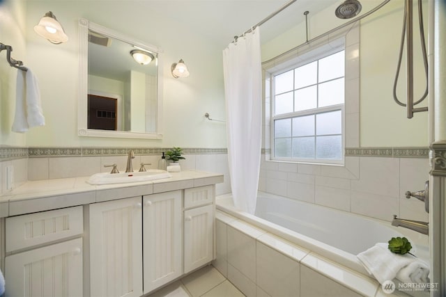 3120 Tanglewood Ln, Bellingham, WA 98226 - full bathroom featuring tiled shower / bath, healthy amount of natural light, vanity, tile patterned floors, and wainscoting