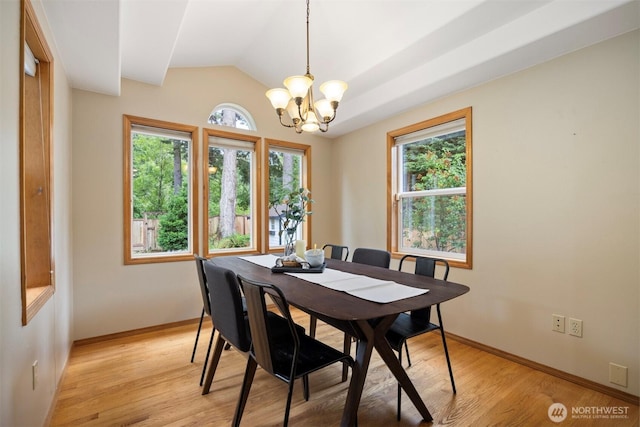 3120 Tanglewood Ln, Bellingham, WA 98226 - dining area with a chandelier, light wood-style floors, and vaulted ceiling