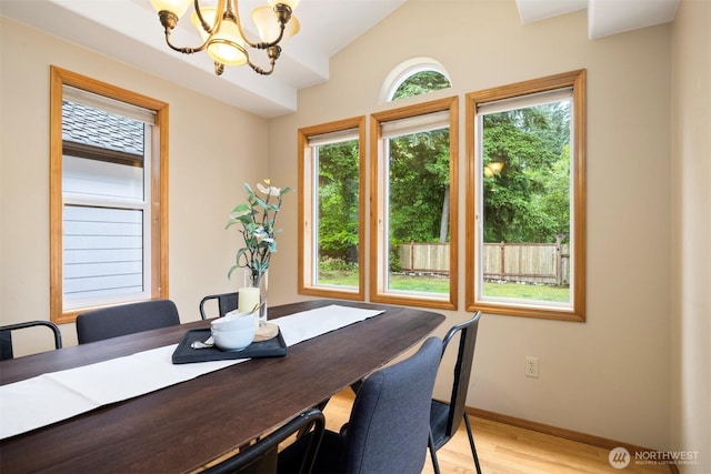 3120 Tanglewood Ln, Bellingham, WA 98226 - dining area featuring a chandelier, light wood-type flooring, and vaulted ceiling