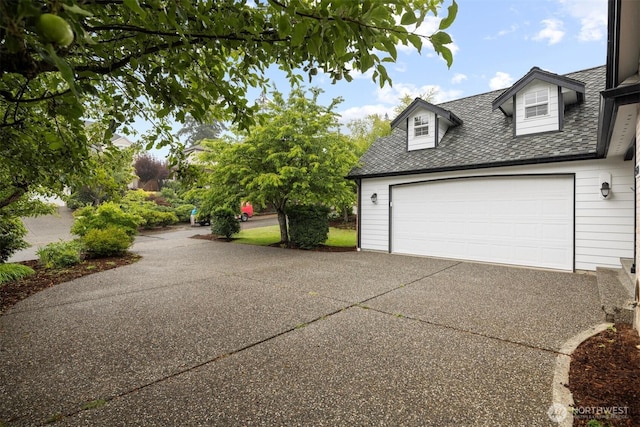 3120 Tanglewood Ln, Bellingham, WA 98226 - view of home's exterior featuring concrete driveway and a garage
