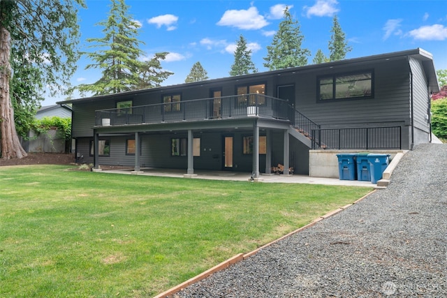 23406 Humber Ln, Edmonds, WA 98020 - rear view of house with a yard, a patio, and stairs