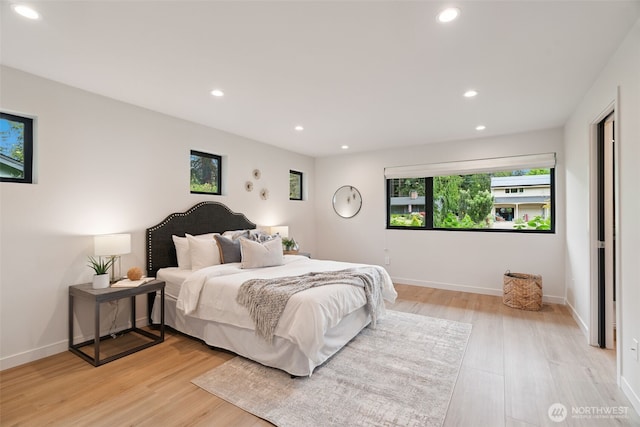 23406 Humber Ln, Edmonds, WA 98020 - bedroom with recessed lighting and light wood-style flooring