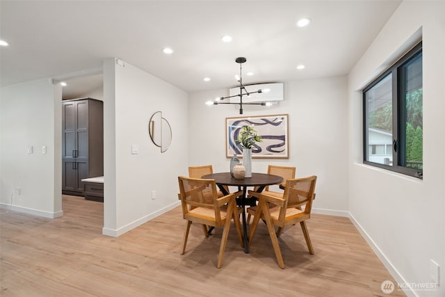 23406 Humber Ln, Edmonds, WA 98020 - dining room with light wood finished floors, recessed lighting, and a chandelier