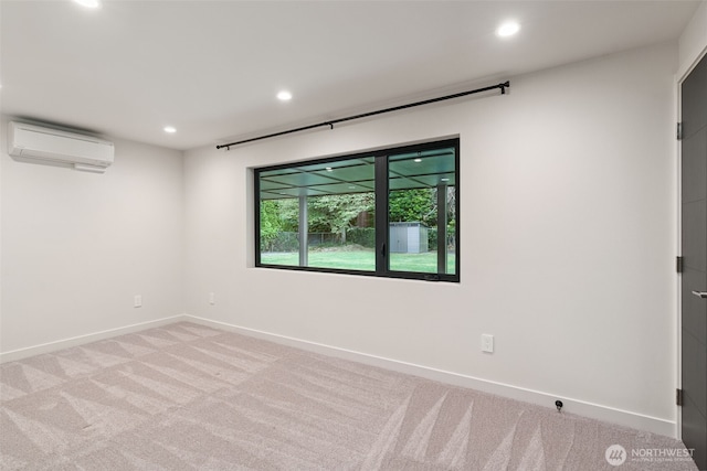 23406 Humber Ln, Edmonds, WA 98020 - empty room with a wall unit AC, recessed lighting, and carpet floors