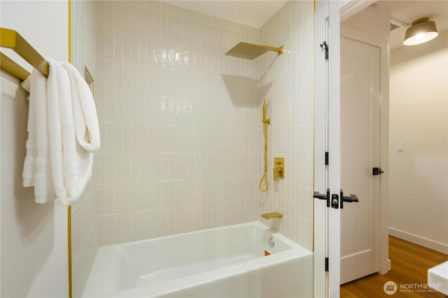 14703 121st Ct NE, Kirkland, WA 98034 - bathroom featuring shower / bath combination and wood finished floors
