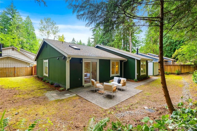 14703 121st Ct NE, Kirkland, WA 98034 - back of house with a fenced backyard, a patio, an outdoor living space, and roof with shingles