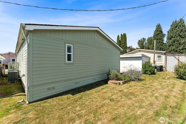 10900 Kuhlmann Rd SE Unit 50, Olympia, WA 98513 - view of side of property featuring a central AC unit and crawl space