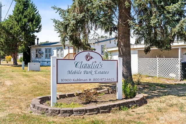10900 Kuhlmann Rd SE Unit 50, Olympia, WA 98513 - community / neighborhood sign with a yard