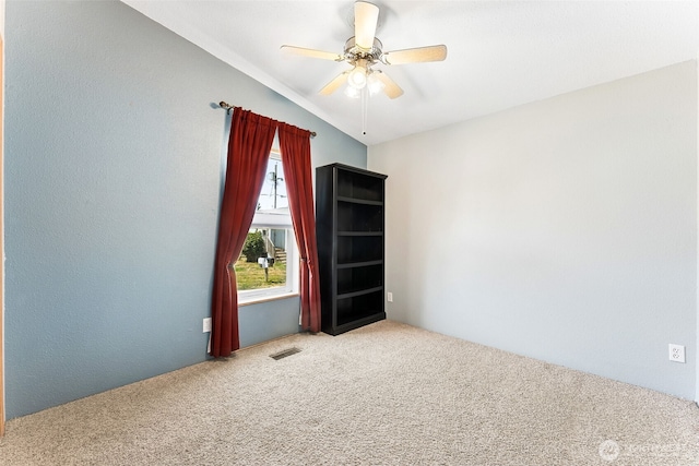 10900 Kuhlmann Rd SE Unit 50, Olympia, WA 98513 - empty room with carpet floors, a ceiling fan, and vaulted ceiling