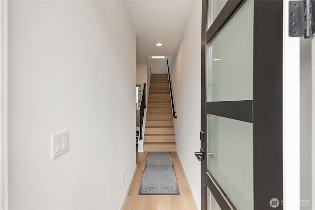 8455 Delridge Way SW, Seattle, WA 98106 - staircase with wood finished floors and recessed lighting