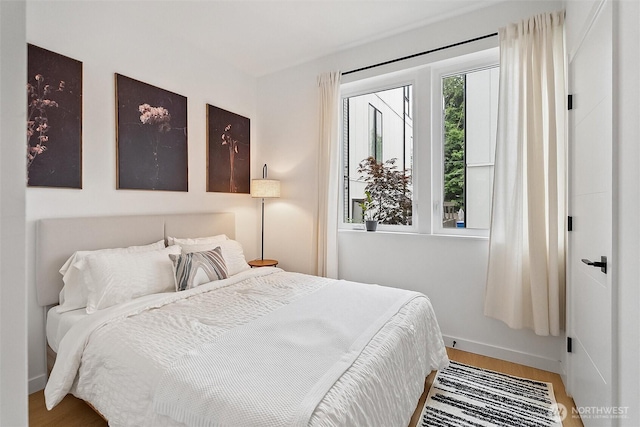 8455 Delridge Way SW, Seattle, WA 98106 - bedroom with wood finished floors and baseboards