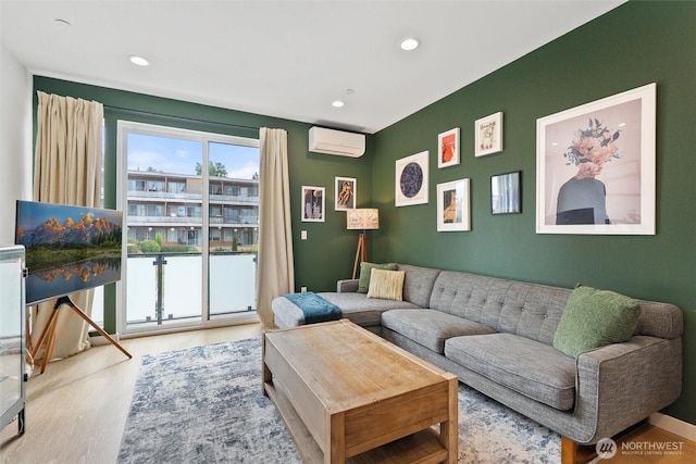 8455 Delridge Way SW, Seattle, WA 98106 - living area with a wall unit AC, wood finished floors, and recessed lighting