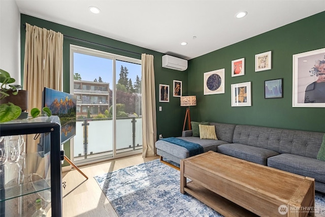 8455 Delridge Way SW, Seattle, WA 98106 - living area with a wall mounted AC, wood finished floors, and recessed lighting
