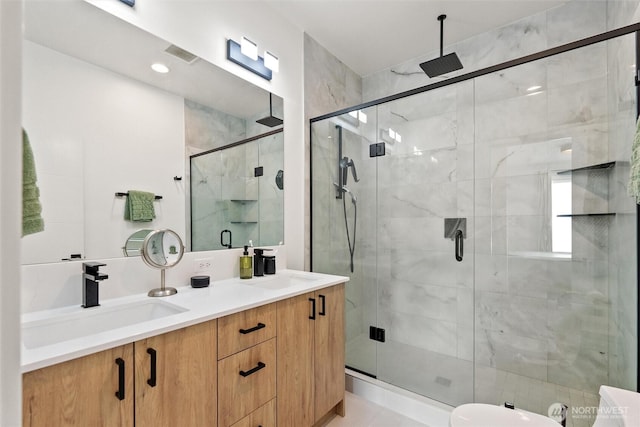 8455 Delridge Way SW, Seattle, WA 98106 - bathroom featuring double vanity and a stall shower