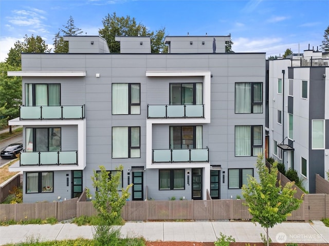 8455 Delridge Way SW, Seattle, WA 98106 - view of building exterior with a fenced front yard