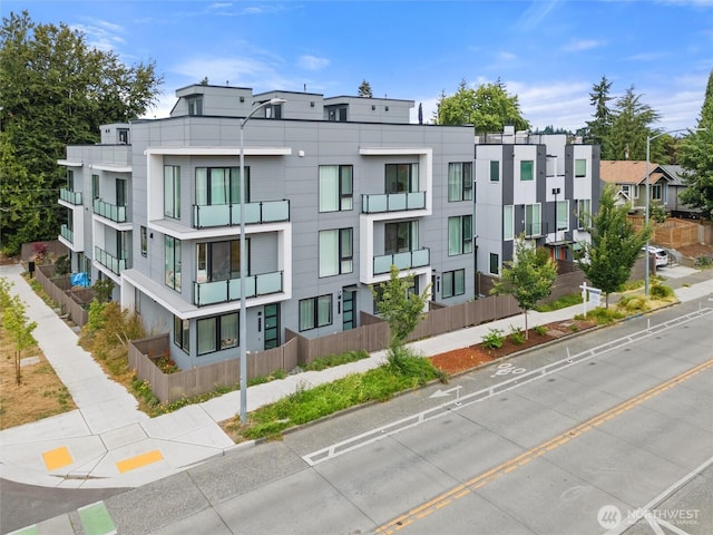 8455 Delridge Way SW, Seattle, WA 98106 - view of building exterior with a residential view