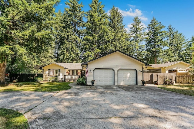 15922 Lindsay Rd SE, Yelm, WA 98597 - view of front facade with an attached garage and concrete driveway