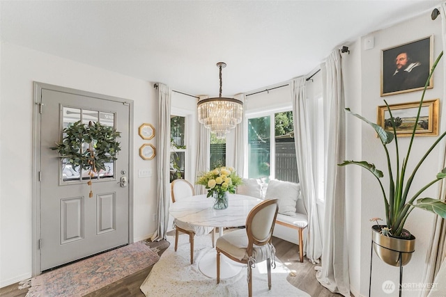 15922 Lindsay Rd SE, Yelm, WA 98597 - dining room with wood finished floors and a chandelier