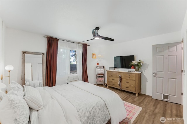 15922 Lindsay Rd SE, Yelm, WA 98597 - bedroom with wood finished floors and a ceiling fan