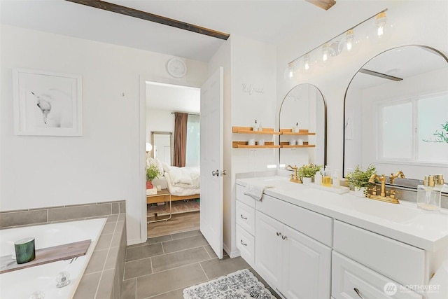 15922 Lindsay Rd SE, Yelm, WA 98597 - ensuite bathroom featuring vanity, tile patterned flooring, and a bath