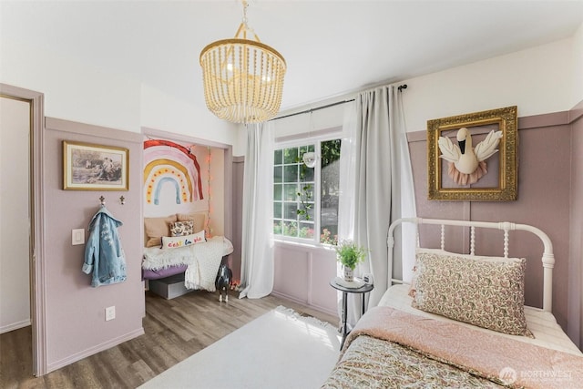 15922 Lindsay Rd SE, Yelm, WA 98597 - bedroom with a chandelier and wood finished floors
