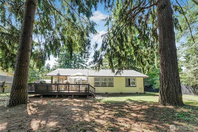 15922 Lindsay Rd SE, Yelm, WA 98597 - back of house featuring crawl space and a wooden deck