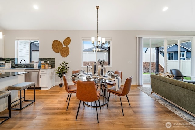 5738 S Zabo Rd, Spokane, WA 99224 - dining room featuring a chandelier, healthy amount of natural light, light wood-type flooring, and recessed lighting