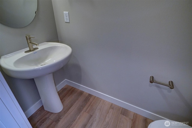 29207 217th Pl SE Unit 1, Black Diamond, WA 98010 - half bathroom with baseboards and wood finished floors