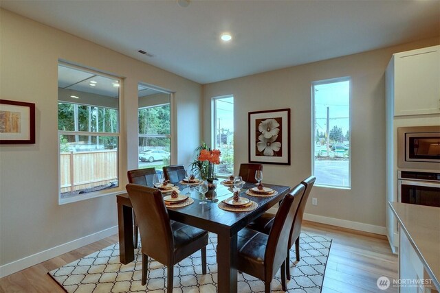 29207 217th Pl SE Unit 1, Black Diamond, WA 98010 - dining room featuring light wood finished floors and recessed lighting