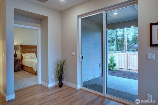 29207 217th Pl SE Unit 1, Black Diamond, WA 98010 - doorway to outside featuring wood finished floors and recessed lighting