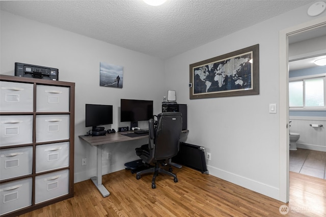 4709 144th St E, Tacoma, WA 98446 - office with wood finished floors and a textured ceiling