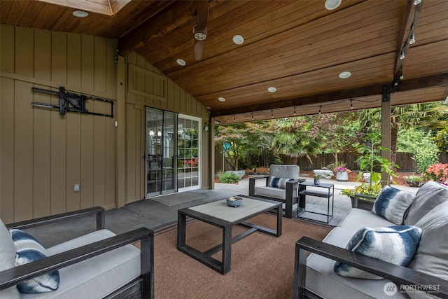 4709 144th St E, Tacoma, WA 98446 - fenced backyard with outdoor lounge area and a patio