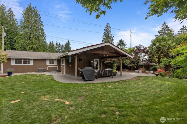 4709 144th St E, Tacoma, WA 98446 - rear view of house with a patio, ceiling fan, and an outdoor living space