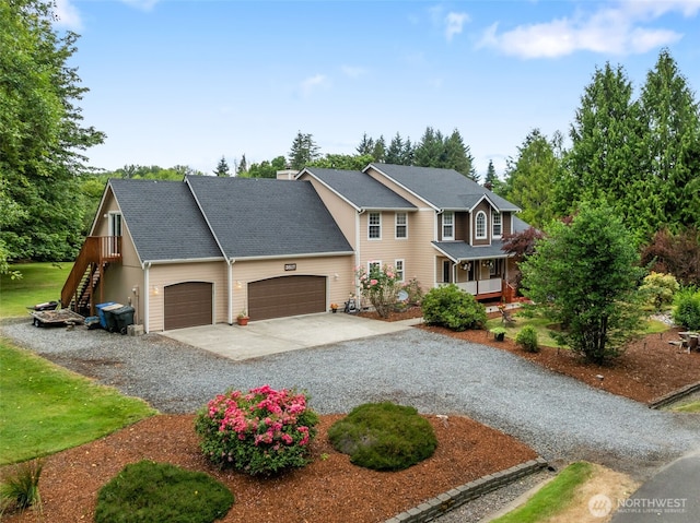 3517 Frogs Leap Ln NE, Olympia, WA 98506 - view of front facade featuring driveway, a garage, and stairs