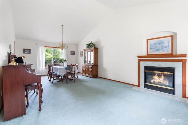 3517 Frogs Leap Ln NE, Olympia, WA 98506 - dining room with a chandelier, carpet flooring, a fireplace, and high vaulted ceiling