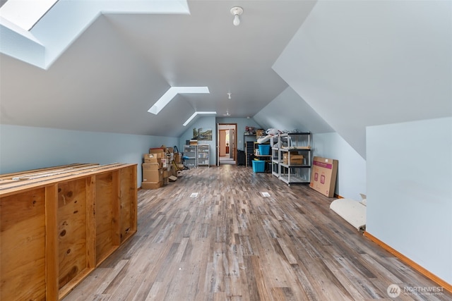 3517 Frogs Leap Ln NE, Olympia, WA 98506 - additional living space featuring a skylight, wood finished floors, and lofted ceiling