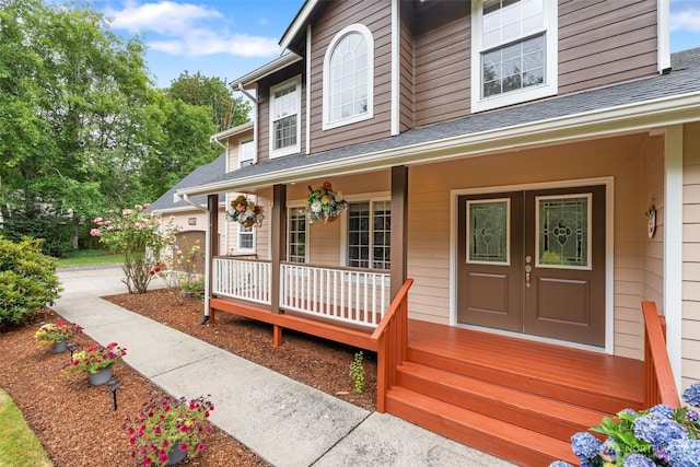 3517 Frogs Leap Ln NE, Olympia, WA 98506 - property entrance featuring a porch, french doors, and roof with shingles