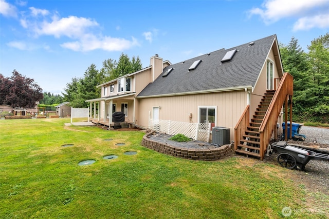 3517 Frogs Leap Ln NE, Olympia, WA 98506 - rear view of property with roof with shingles, a chimney, stairs, and a yard