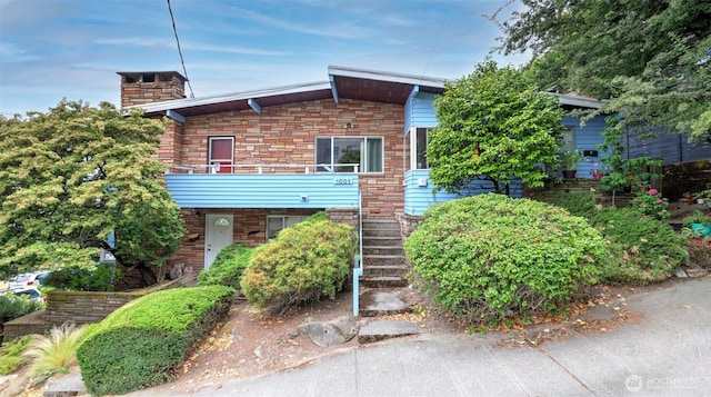 1001 1st Ave N, Seattle, WA 98109 - townhome / multi-family property with stairway and a chimney